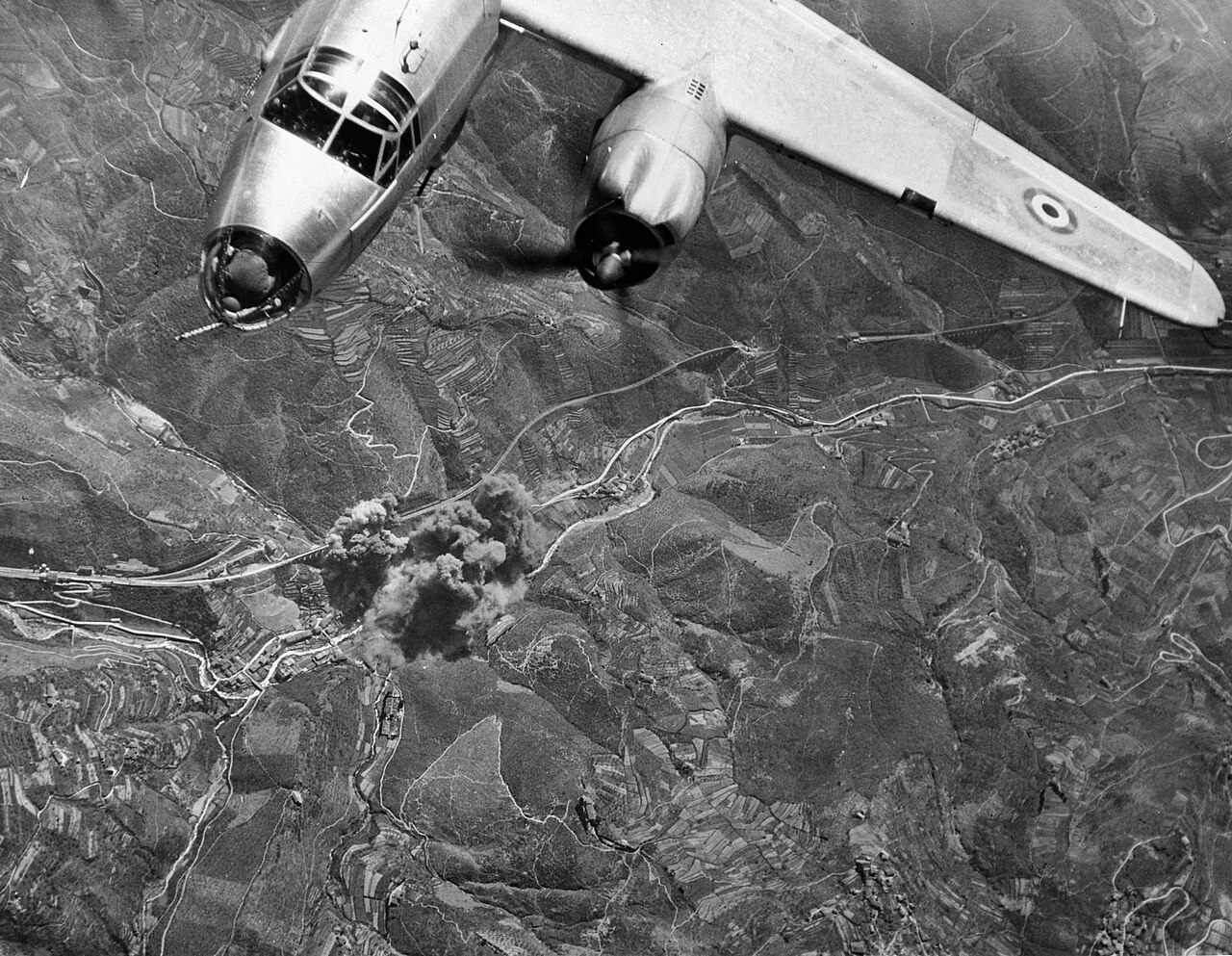 A French-marked B-26 over a rail viaduct strike in central Italy during Operation Strangle